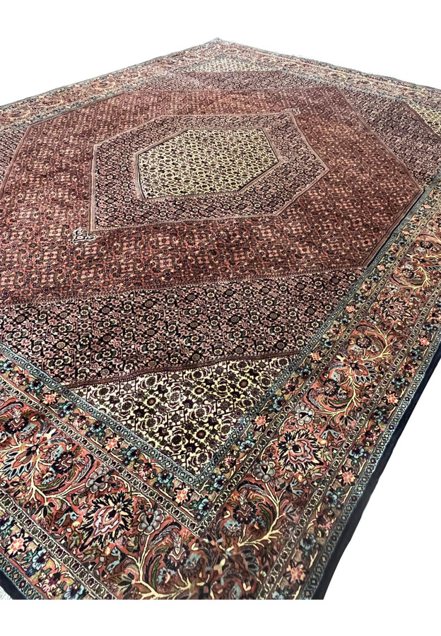 Angled view of Persian Bijar Iron Rug showing textured pile, medallion layers, and intricate floral motifs.