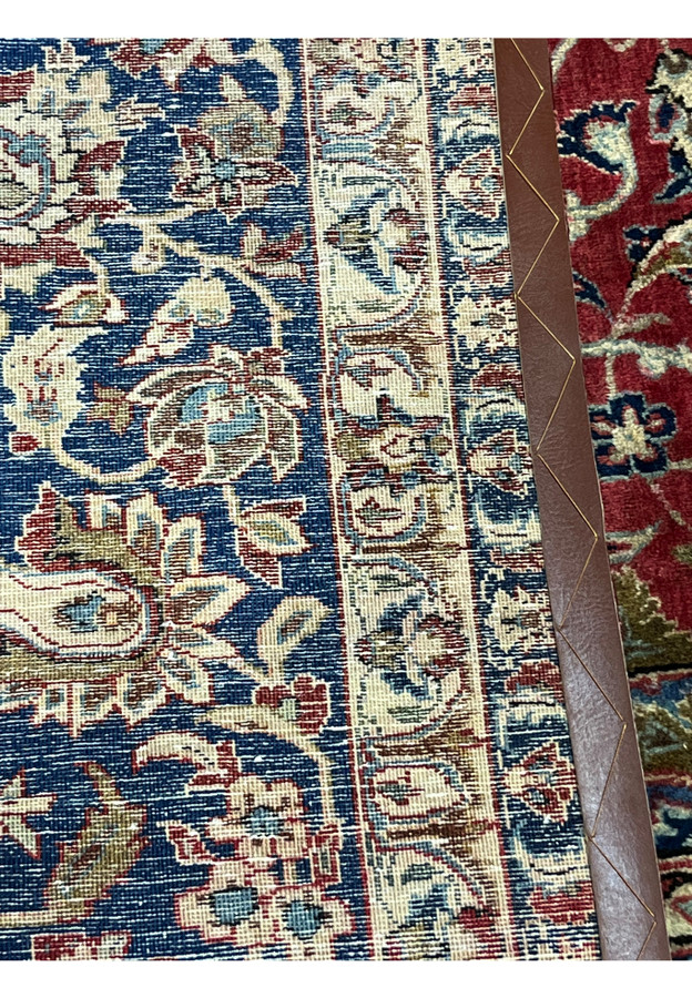 Detailed backside weave of a Najafabad Persian rug showing knot density, color transitions and traditional Persian craftsmanship.