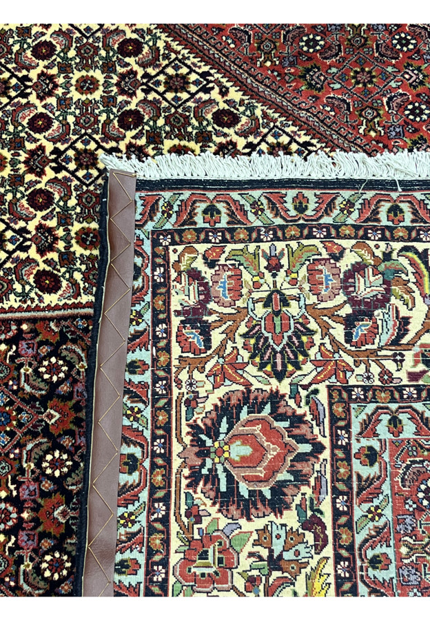 Full backside view of hand knotted 10x13 Persian Bijar rug showing tight weave and heavy wool foundation
