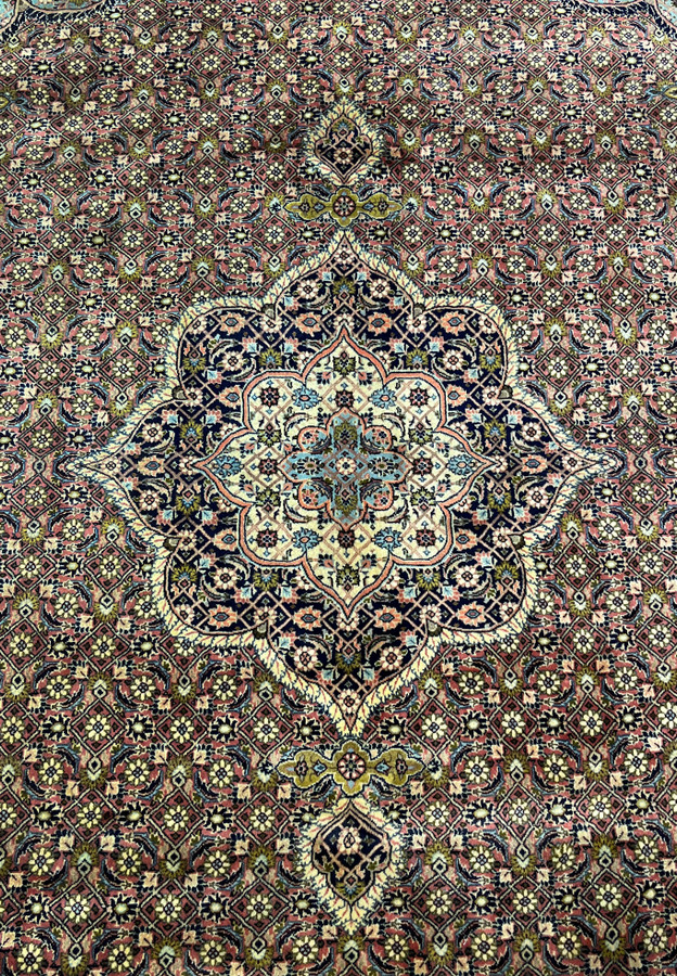 Close-up of medallion on Persian Bijar iron rug showing crisp outlines and dense wool pile