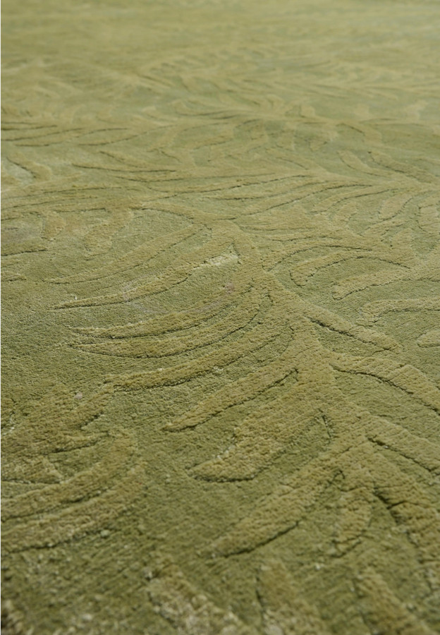 Close-up of the cotton foundation backing that supports the durable handmade construction of this modern rug.