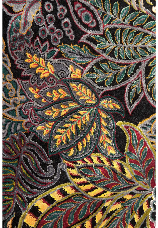 Pattern closeup revealing intricate silk knot work and botanical detailing in a high density Persian Qum rug