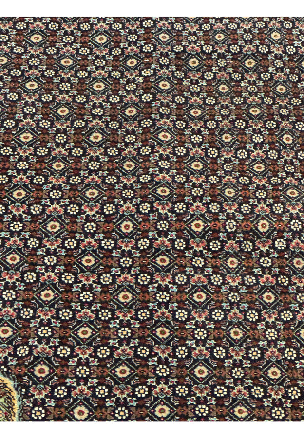 Detailed view of the classic mahi fish pattern on an 11.5 x 16.5 Persian Tabriz 50 Raj rug, highlighting precision weaving, symmetrical geometry, and rich jewel toned accents