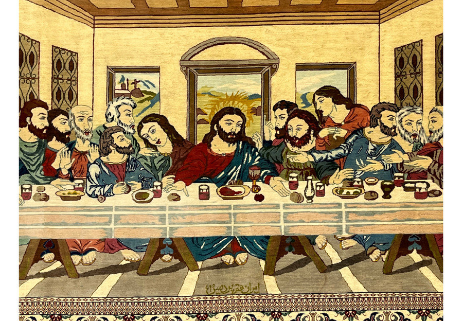 Close-up of central figure in signed pure silk Persian Qum Pardis Last Supper rug showing expressive features and fine silk color transitions