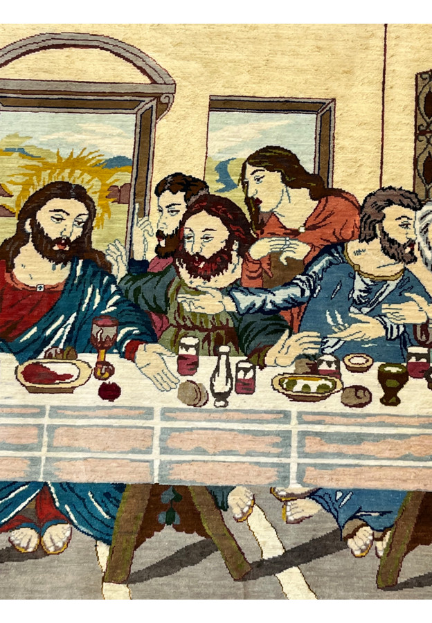 Close-up of figures in signed pure silk Persian Qum Pardis Last Supper rug showing expressive faces, detailed robes, and high-definition silk weaving