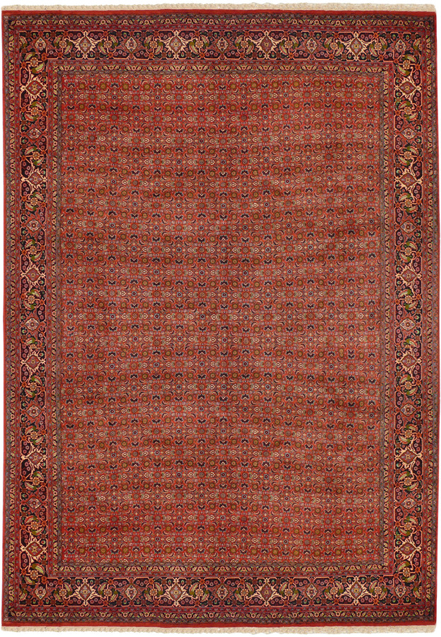 Full view of hand-knotted Persian Bijar rug with brick red field, repeating floral lattice, and detailed navy border
