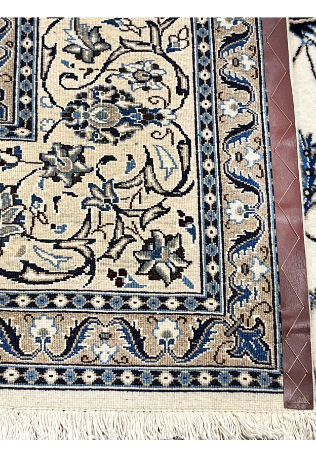 Back side of 8x11 Persian Nain 9La rug showing hand-knotted construction and knot density