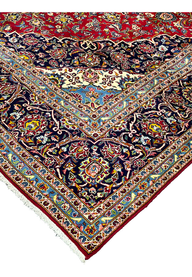10x14'7 Persian Kashan rug featured on Shark Tank corner edge crimson navy border ivory fringe