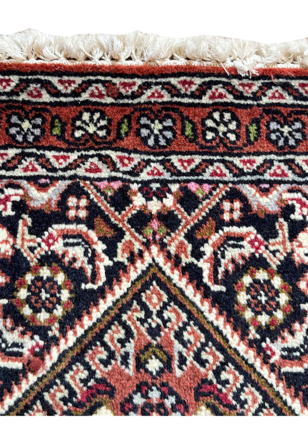 1x2 Persian Bijar baby rug upper border fringe detail rust navy ivory rosette pattern