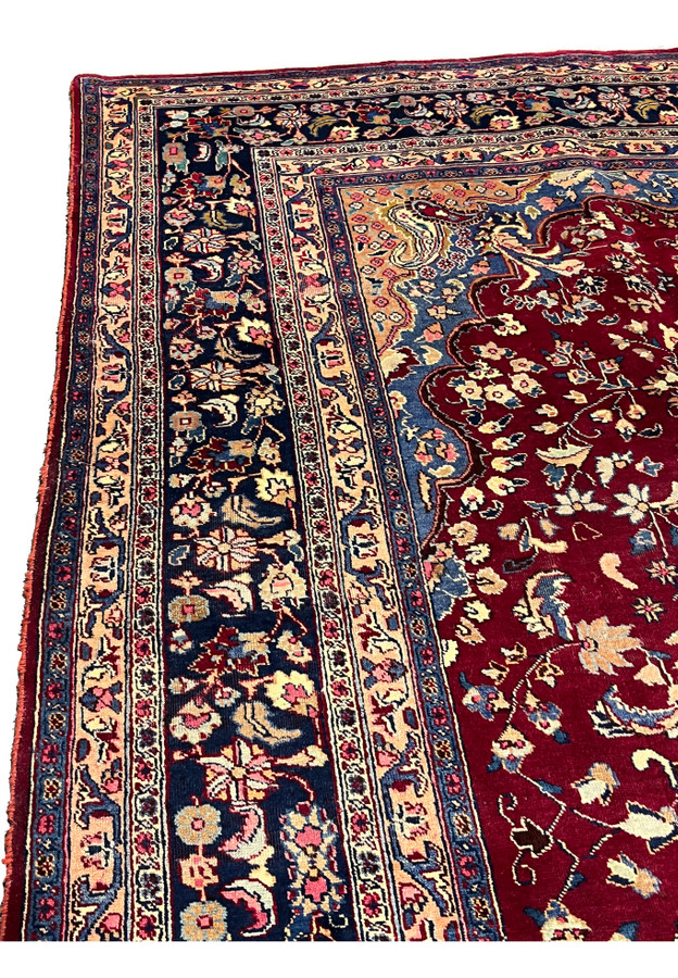 10x13 distressed antique Persian Mashad rug upper edge border red field transition detail