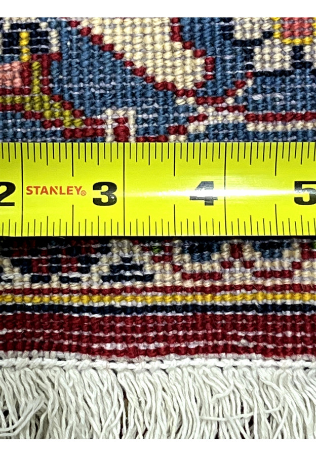 Knot density measurement with ruler confirming 220 to 240 KPSI on this handmade Persian Kashan rug