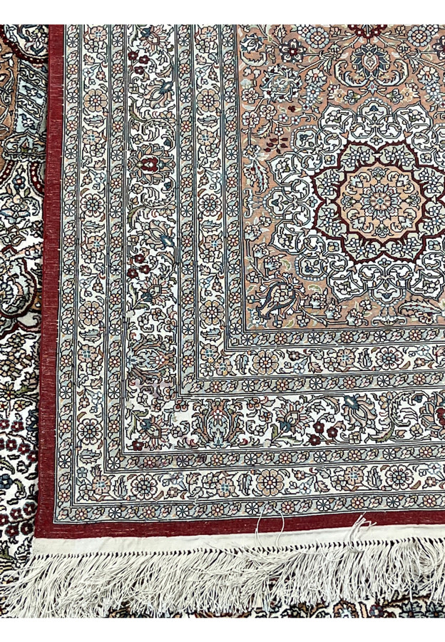 Backside of this authentic Turkish silk rug showing fine hand-knotted weave on pure silk foundation