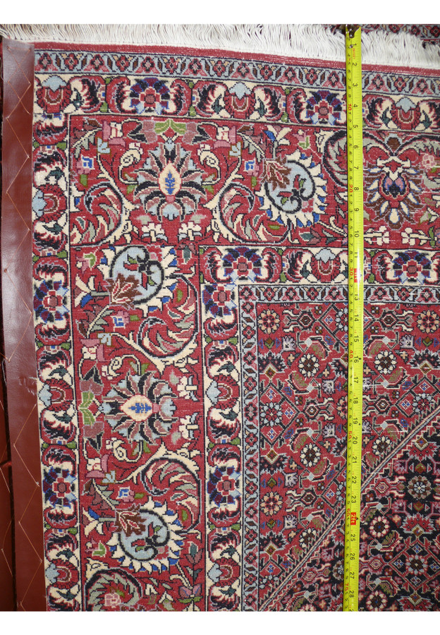Persian Bijar Bukan rug border measured for size showing dense double-weft hand-knotted wool construction