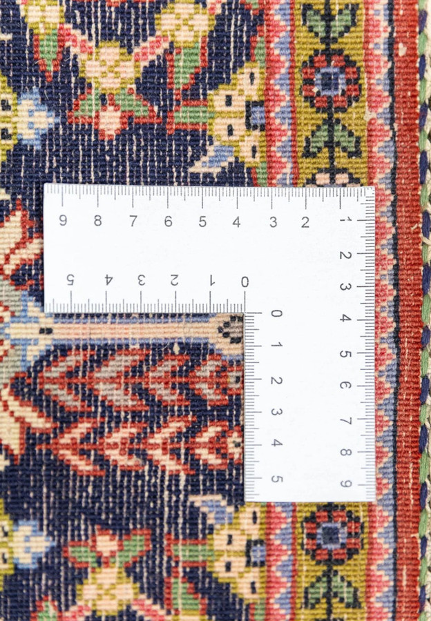 Backside of vintage Persian Qum measured at 400 KPSI showing 640000 knots per square meter weave density