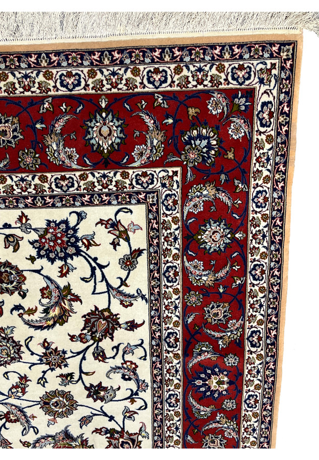 Crimson main border with palmette cartouches and scrolling vines flanked by ivory guard stripes