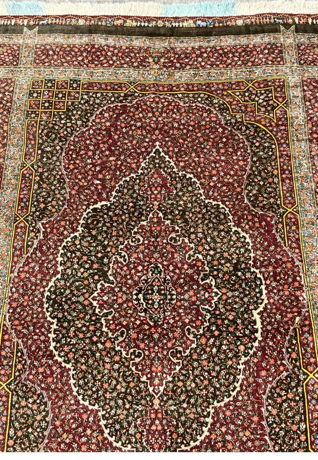 Detail of the burgundy and espresso brown field showing thousands of miniature silk blossoms