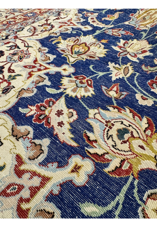 Macro back view showing knot definition on the silk foundation with the Shah Abbasi field motifs reading clearly from the underside of the rug