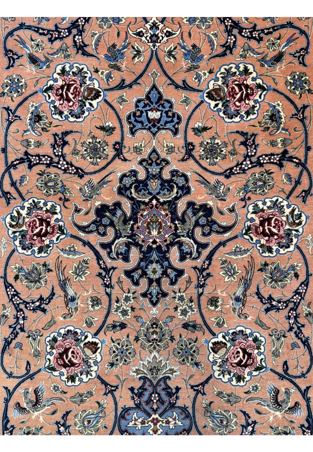 Center axis detail showing the indigo cartouche anchor with palmette infill flanked by rose roundels on the salmon Isfahan field