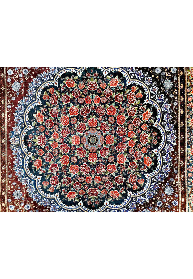 Central scalloped medallion of Persian Qum silk on silk rug, dense rose garden on midnight blue field with lobed cusps