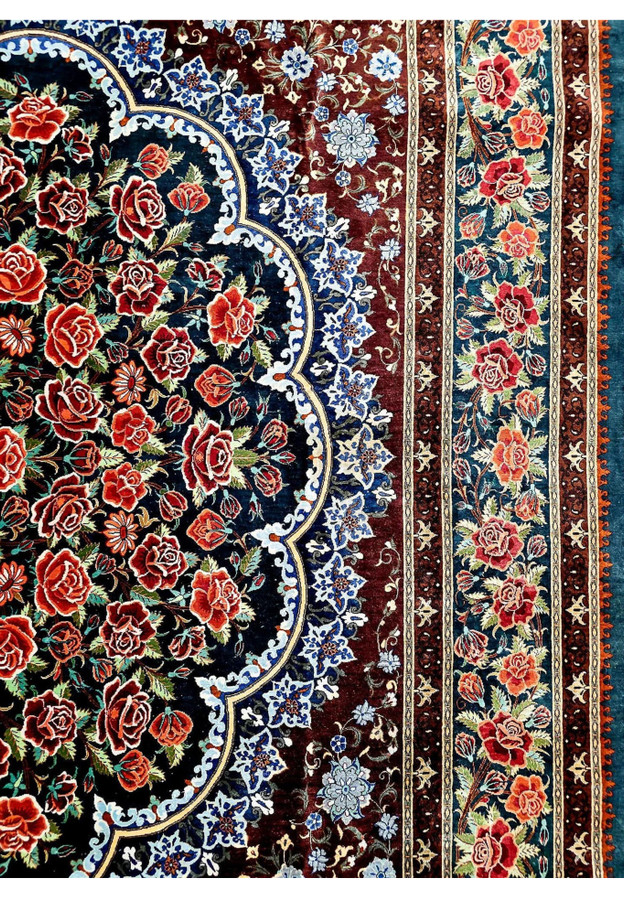 Wine red field with slate blue palmettes meeting the rose garland border on signed Mohseni Persian Qum silk rug