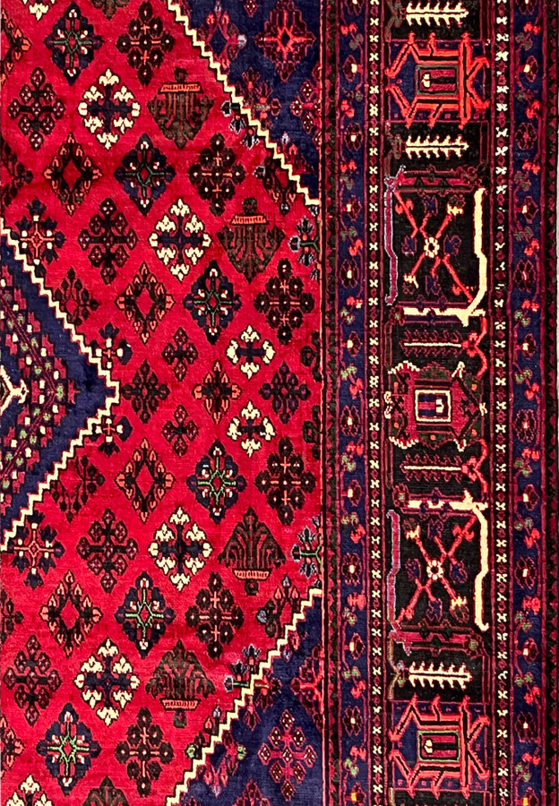 Side border detail of Persian Meymeh rug showing paired hooked cross panels on black ground, ivory X-cross guards