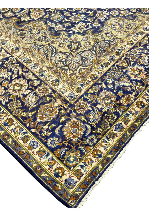 Edge of 10x13 Persian Kashan, navy main border meeting ivory fringe, intact selvage, hand-knotted wool, for living room