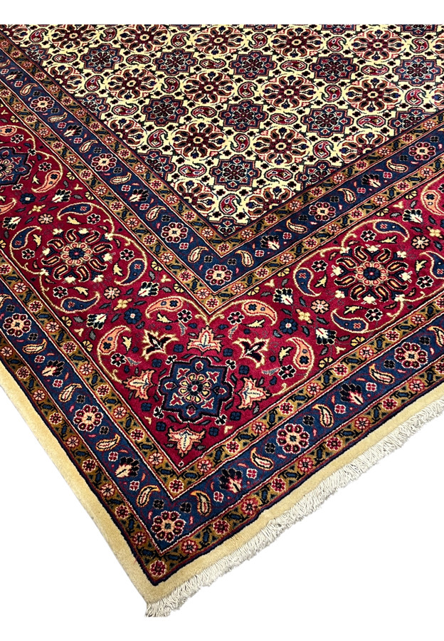 Edge of 10x13 Persian Mashad, deep red main border with ivory paisleys, blue guard stripes, hand-knotted Kork wool