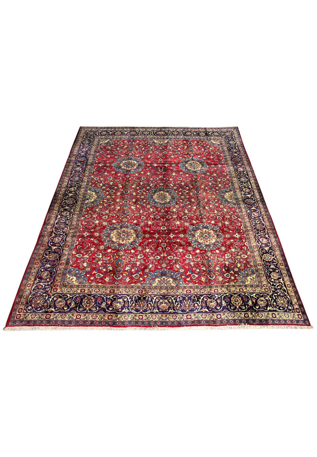 10x13 Persian Isfahan rug laid down, oversize hand-knotted wool on cotton, allover floral in red and navy for large dining room