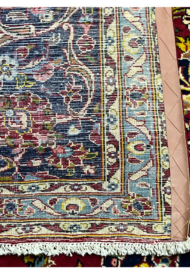 Backside of Persian Kashan rug, tightly woven cotton foundation and clean knot detail, authentic Kashan workshop production