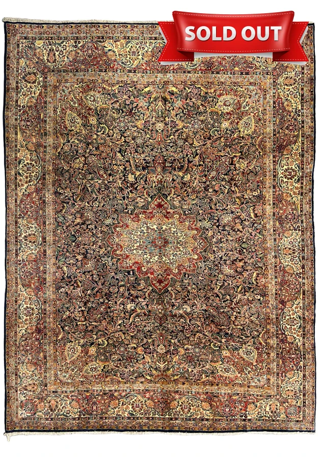10'6 by 13'5 antique Persian Sarough rug full view, navy field with ivory medallion and crimson centerpiece
