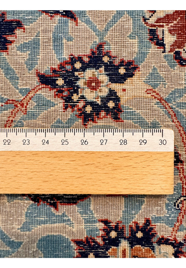 Backside knot measurement of master signed Isfahan rug, ruler confirming ultra fine 600 KPSI density