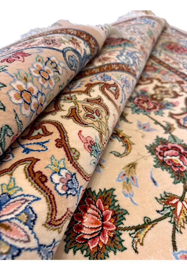 Rolled view of authentic Persian Isfahan rug by Master Habib, full kork pile and silk highlights along the roll