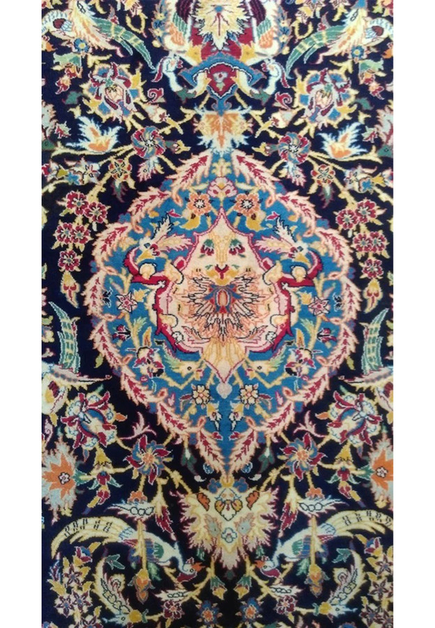 Center medallion of Persian Isfahan rug, sky-blue cartouche with acanthus leaves on navy