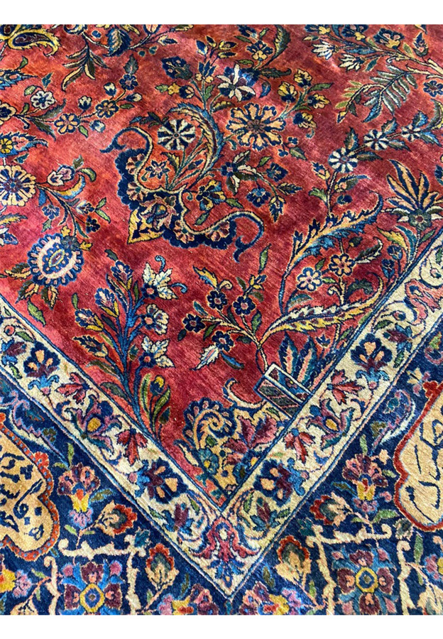 Inner border of antique Persian Sarough rug, flowering vines on red and navy ground