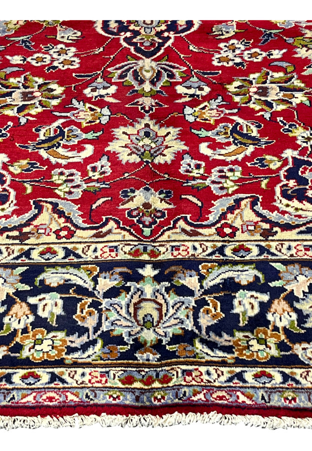 Lower border with floral cartouche and sky-blue scrollwork on navy ground, classical Persian Najafabad wool rug