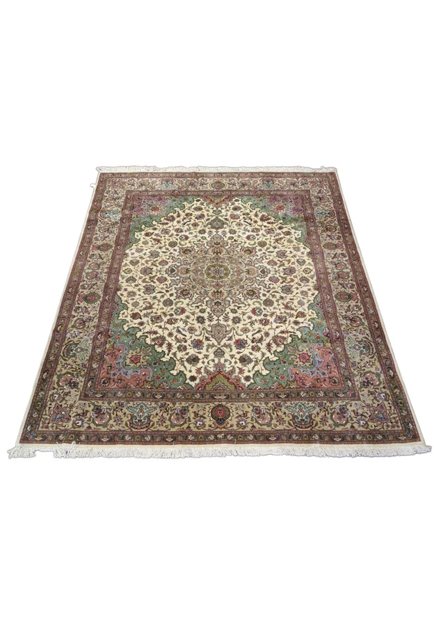 Full overhead view of Persian Tabriz 50 raj wool and silk rug, ivory field with salmon and coral spandrel accents