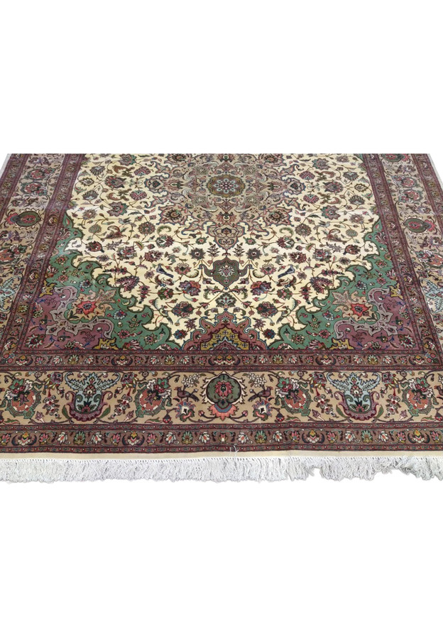 Lower section of 8 x 9'4 Persian Tabriz wool and silk rug showing dense allover floral lattice on ivory field