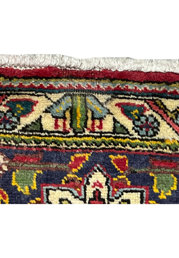 Low pile area on the Tabriz showing gentle wear consistent with a forty year old handmade rug