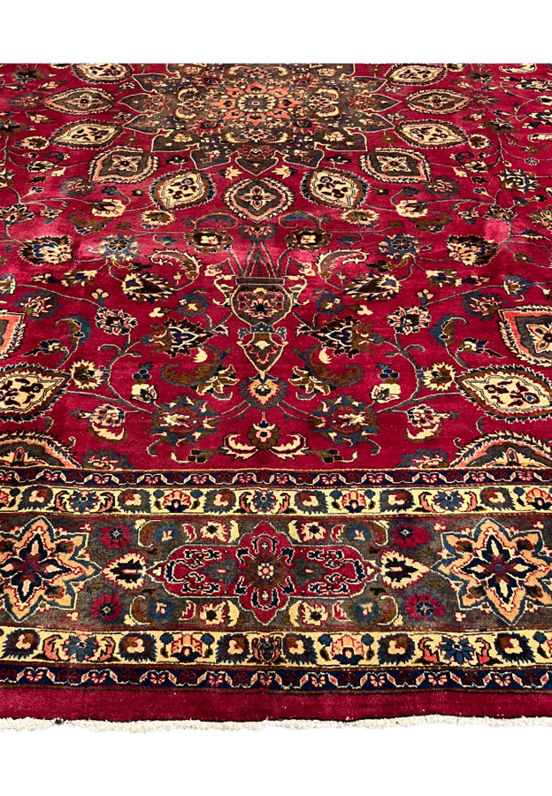 Lower field and grey border of the Persian Mashad with star rosettes and floral palmettes