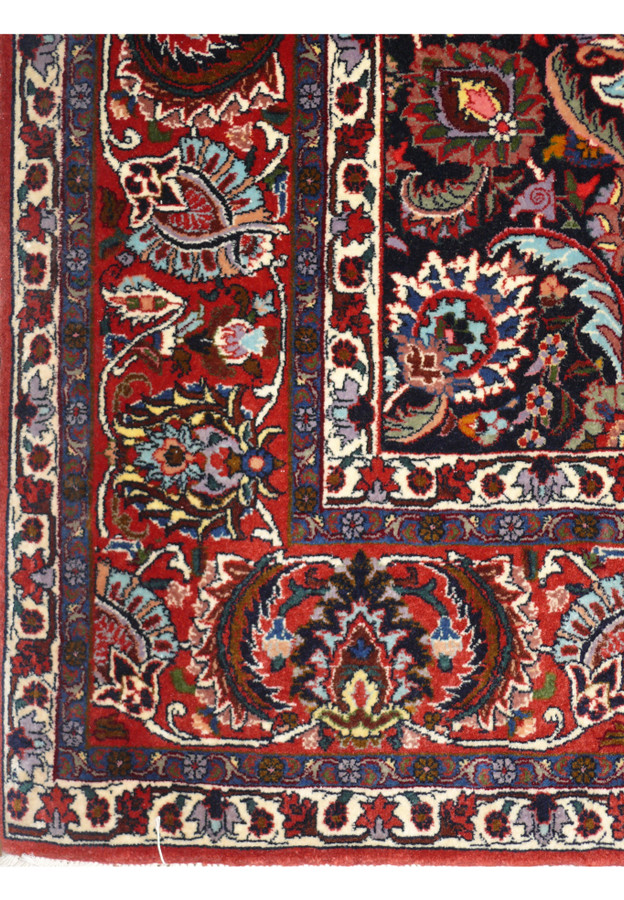 Red main border of bold floral palmettes framing the navy field, authentic handmade Bijar Halvai detail