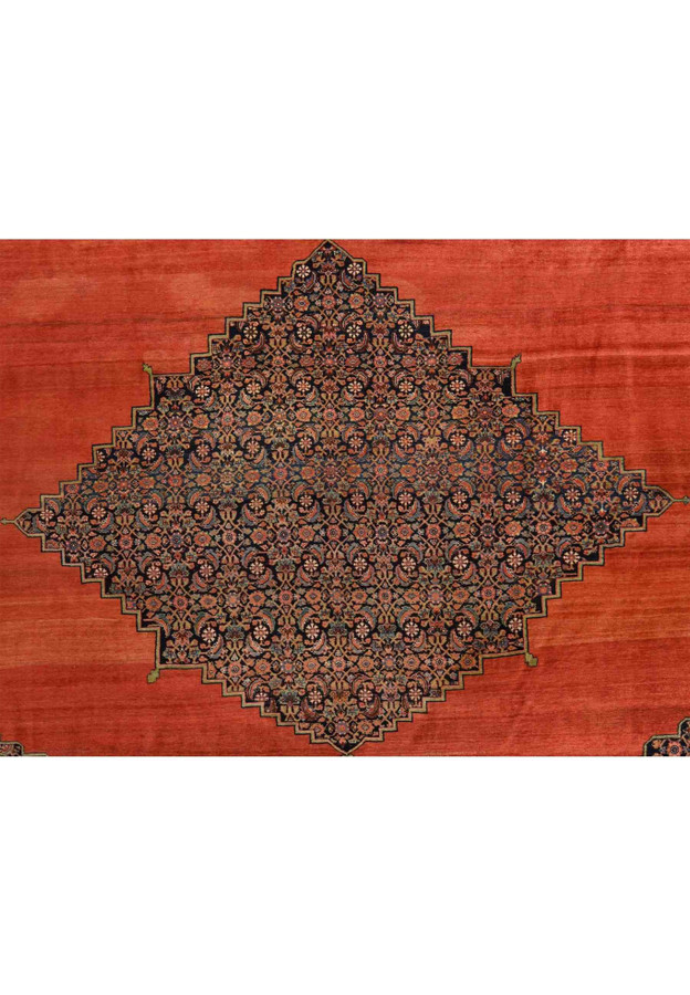 Stepped navy diamond medallion densely filled with Herati florals on the open copper-red Bijar field