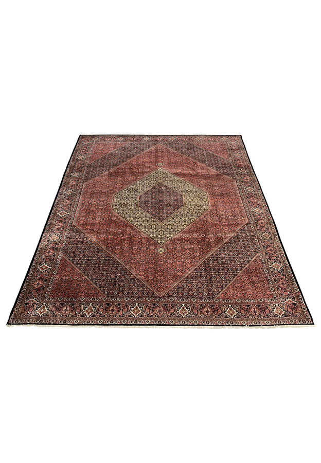 Hand-knotted wool Bijar laid flat, showing the rose red Herati field and concentric diamond medallion.