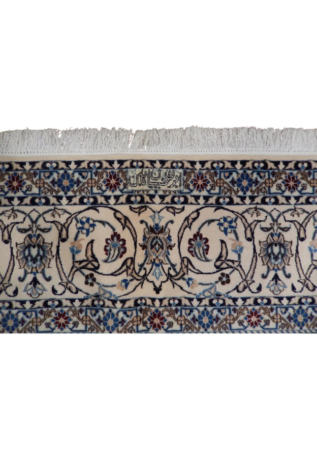 Woven Habibian signature cartouche in the border, proof of authentic master workshop Nain weaving