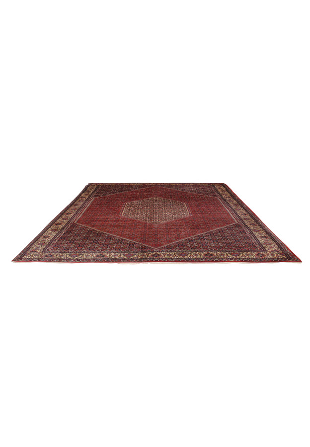 Red and navy Bijar laid flat showing nested diamond composition, built for high traffic rooms