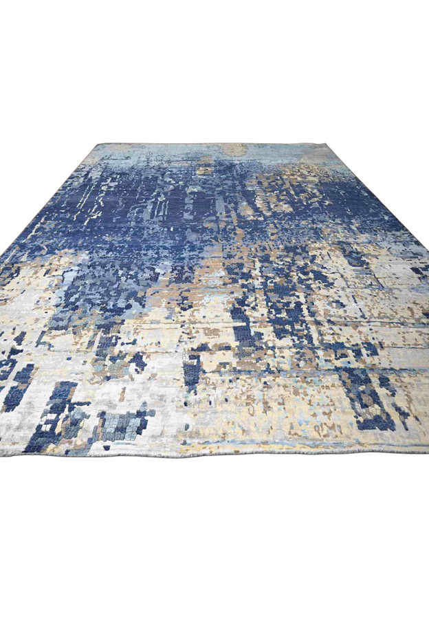 Top view showing borderless blue gradient from deep navy to pale turquoise across huge hand knotted modern wool and silk rug