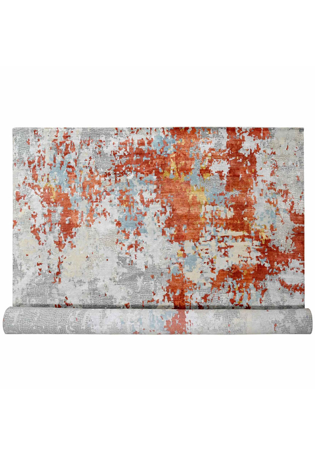 Full view of 14x18 modern abstract area rug with burnt orange eruptions on grey mosaic ground
