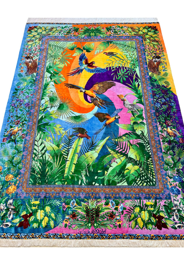 Signed Qum silk pictorial laid flat showing jungle scene, floral borders and ivory fringe