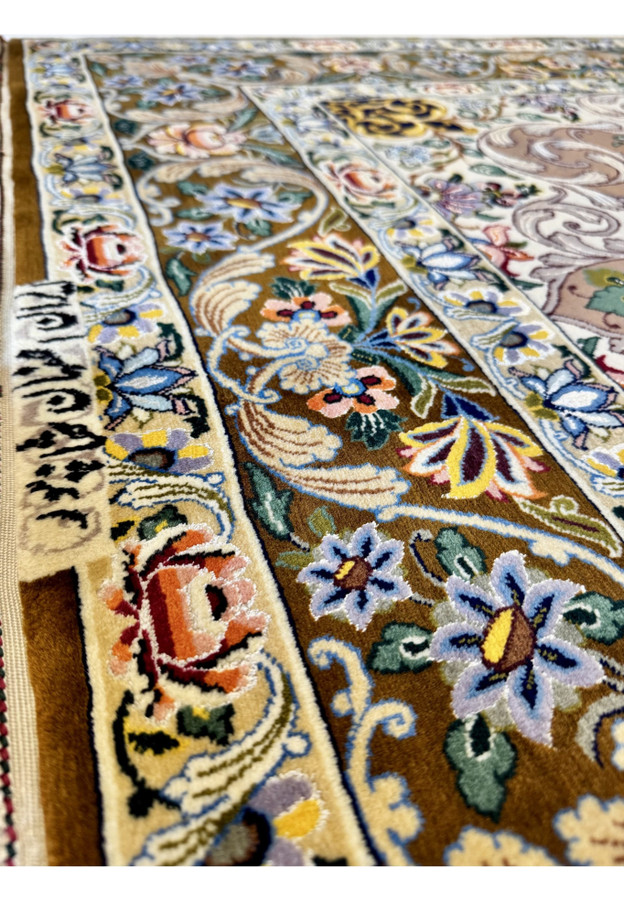 Silk highlights catching light across scrollwork leaves and a blue floral cartouche