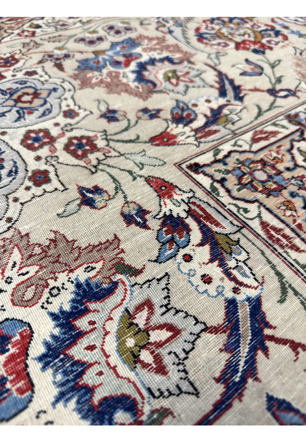 Back of the rug close up, tight knotting on silk warps giving pinpoint design clarity