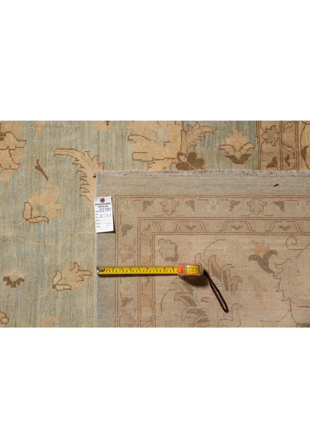 Tape measure and tag on the back documenting the knot density on a cotton foundation